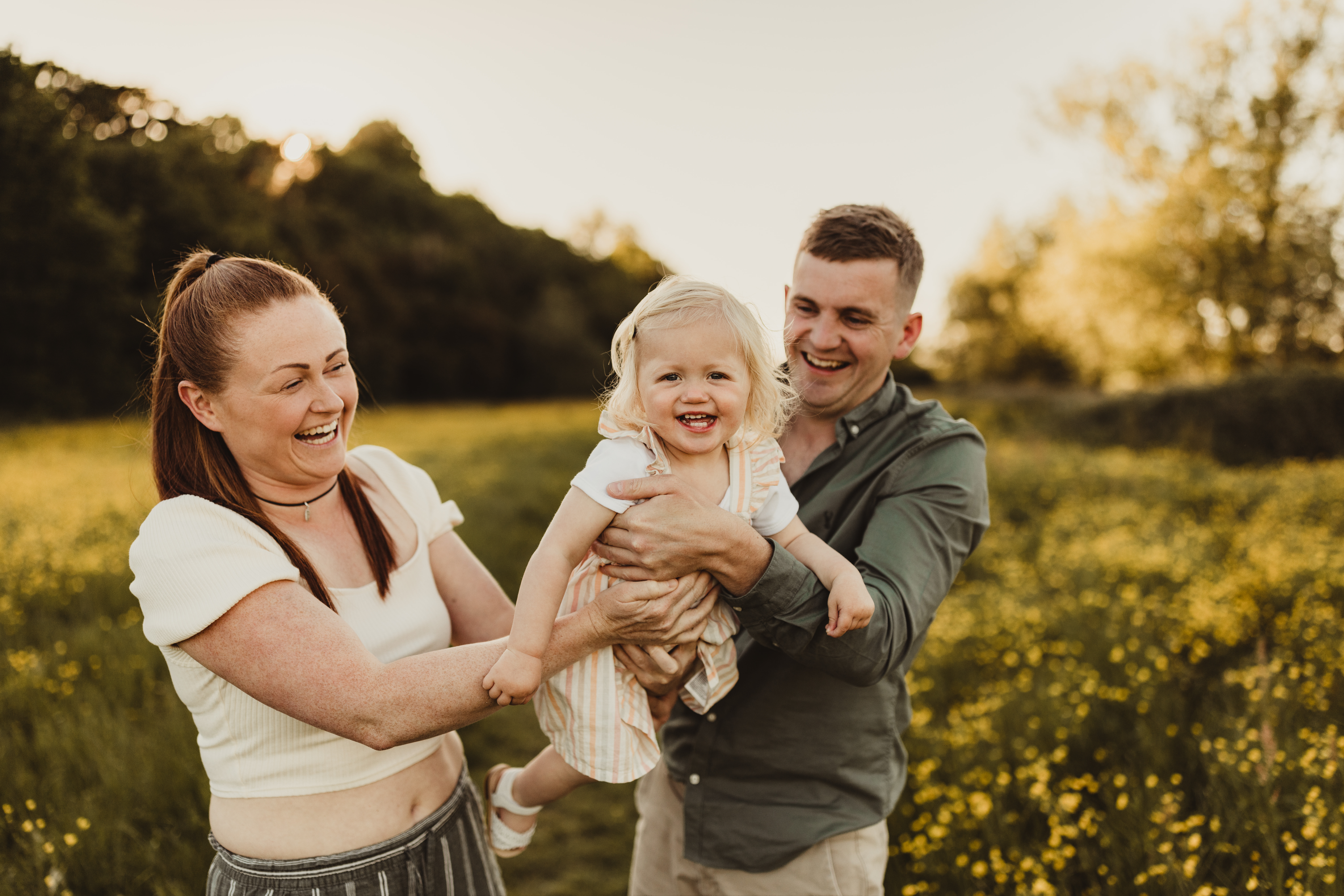 Fun Family photoshoot amongst the buttercups in Herefordshire